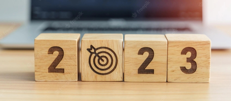 2023-year-block-with-dartboard-icon-against-computer-laptop-background-goal-target-resolution-strategy-plan-action-mission-motivation-new-year-start-concepts_42256-9662